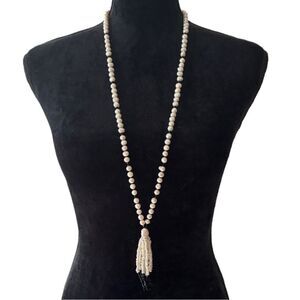 Long freshwater Pearl strand with tassel black accents 21” long flapper necklace